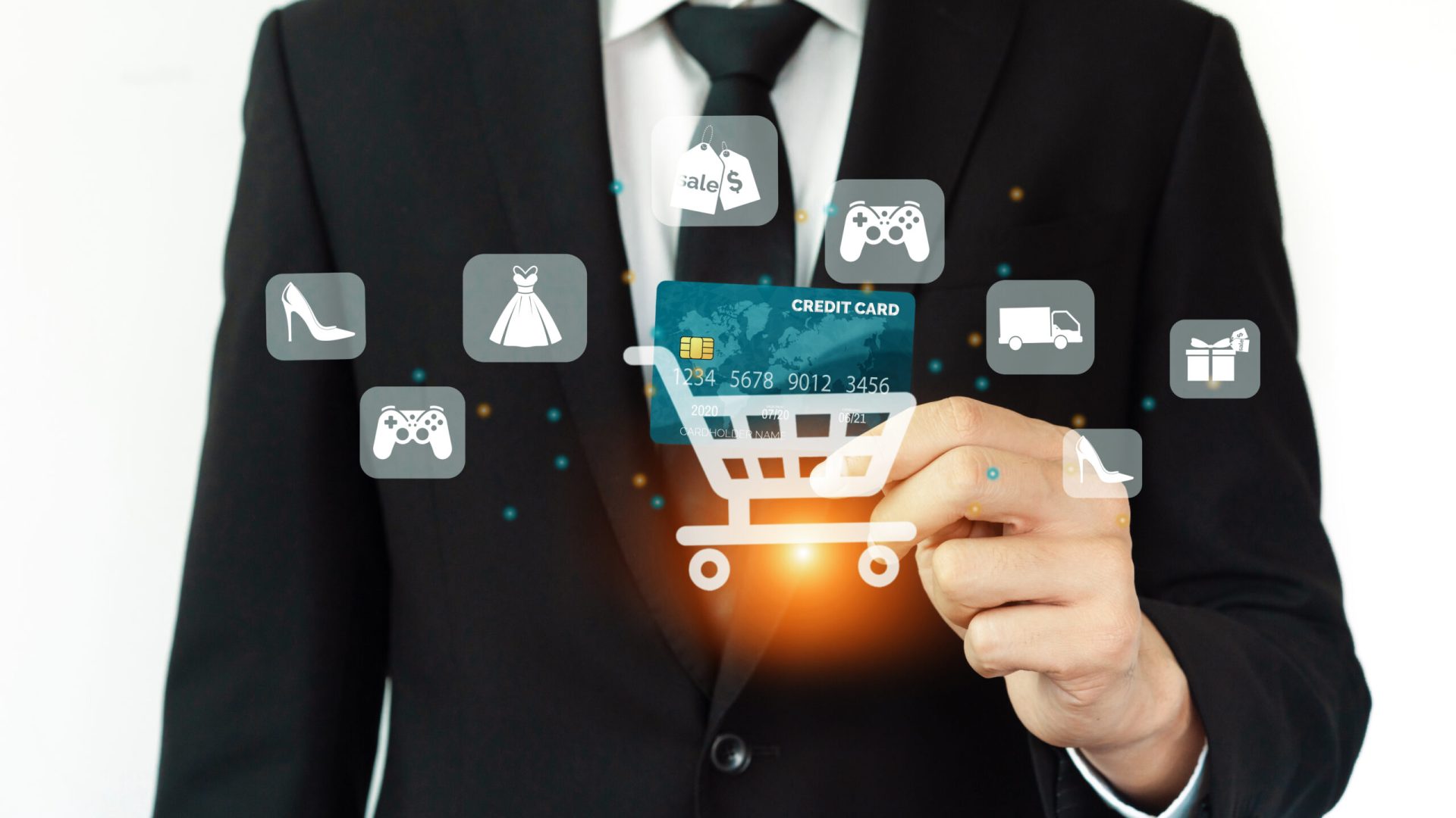 Elegant customer wear black suit and tie hold credit card, cashless technology, by left hand. Smart consumer use hologram graphic interface of e-commerce application platform around hands. Cybercash.